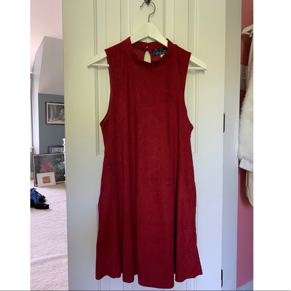 Francesca’s red suede dress with pockets
